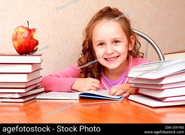 Smart girl reading a book and learns