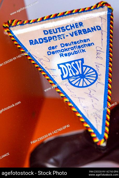 PRODUCTION - 28 March 2023, Mecklenburg-Western Pomerania, Malchow: A pennant of the German Cycling Federation is on display in a special exhibition on the...