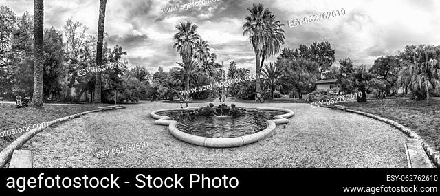 ROME - NOVEMBER 21, 2021: Scenic fountain inside the historical Botanical Garden of Rome, Italy