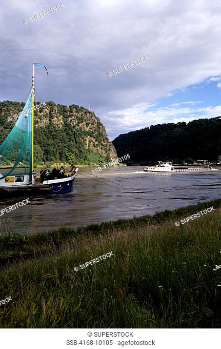 Germany, Rhine River, View Of The 'Loreley Lorelei' Rock, Old Fishing Boat In Foreground