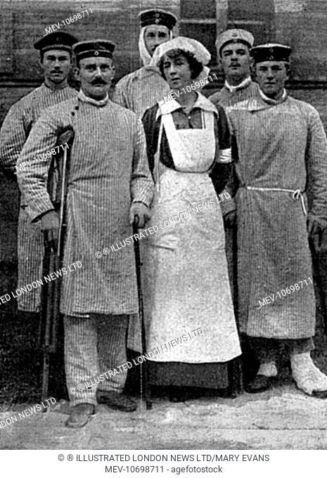 Daisy, Princess of Pless, pictured as a nurse with wounded German soldiers in Berlin during the First World War. Daisy, Princess Henry of Pless (1873 - 1943)