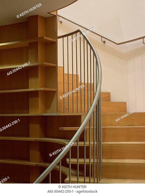 Maggie's Centre, Ninewells Hospital, Dundee, Scotland. Library book shelving by stairs