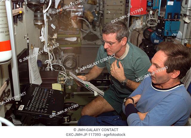 Astronaut William S. (Bill) McArthur Jr. (left), Expedition 12 commander and NASA space station science officer, and cosmonaut Valery I