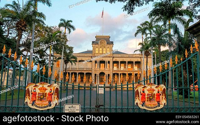 the front gates of iolani palace in honolulu, the only royal palace in the united states