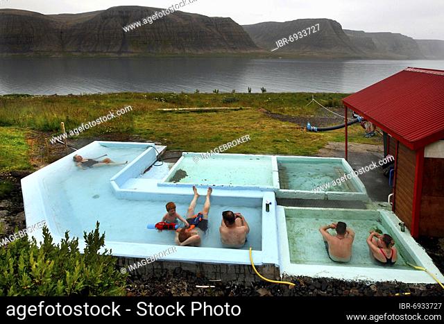Hot pot, hot water pool, geothermal bath, bathers, Pollurinn, Tálknafjörður, Vestfirðir, Westfjords, North-West Iceland, Iceland, Europe