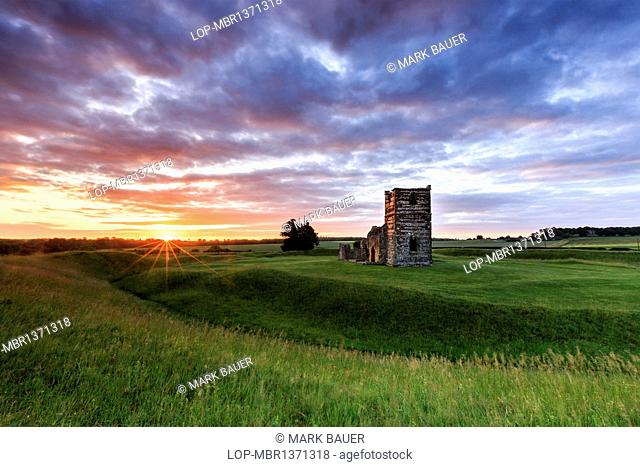 England, Dorset, Knowlton. Sunrise at the ruins of Knowlton Church in Dorset
