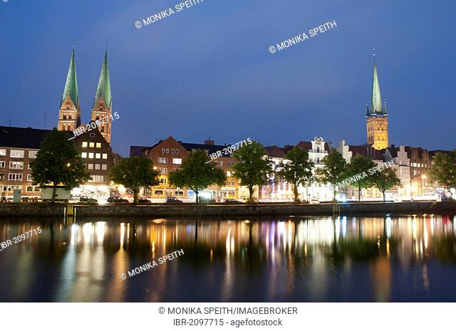 Cityscape on Obertrave river at night, Hanseatic city of Luebeck, UNESCO World Heritage Site, Luebeck Bay, Baltic Sea, Schleswig-Holstein, Germany, Europe