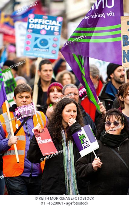 Hundreds of trades union members and other supporters marched through the streets of Aberystwyth in protest at plans to cut their pensions  An estimated 2...