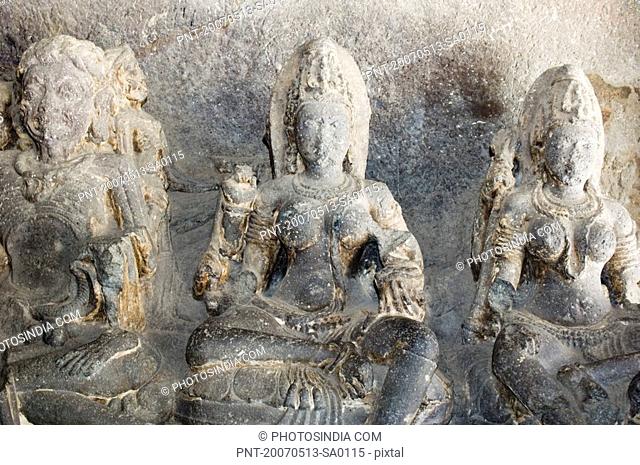 Statues of Hindu goddess carved in a cave, Ellora, Aurangabad, Maharashtra, India
