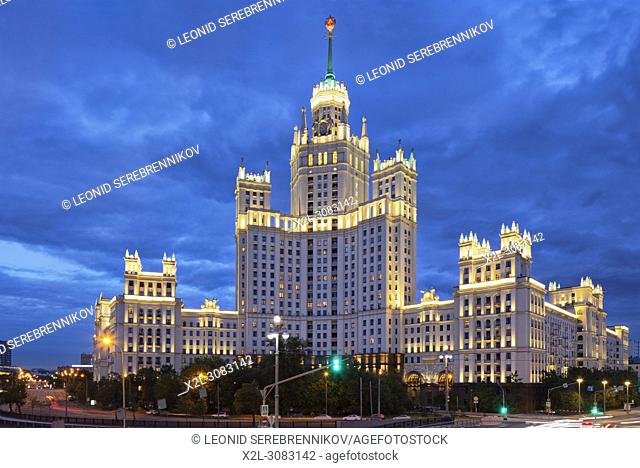 Residential high-rise building on Kotelnicheskaya Embankment illuminated at dusk. Moscow, Russia