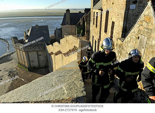firemen in training on the ramparts of Mont-Saint-Michel, Manche department, Normandy region, France, Europe