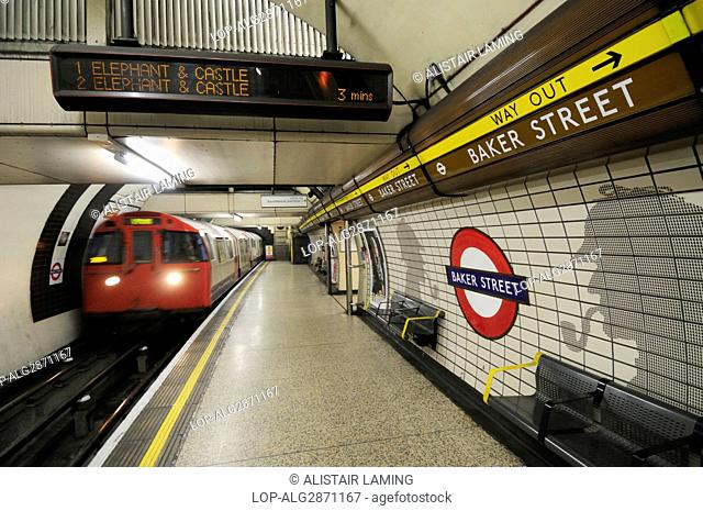 England, London, Baker Street. A tube train departing a platform on the Bakerloo line at Baker Street Underground Station
