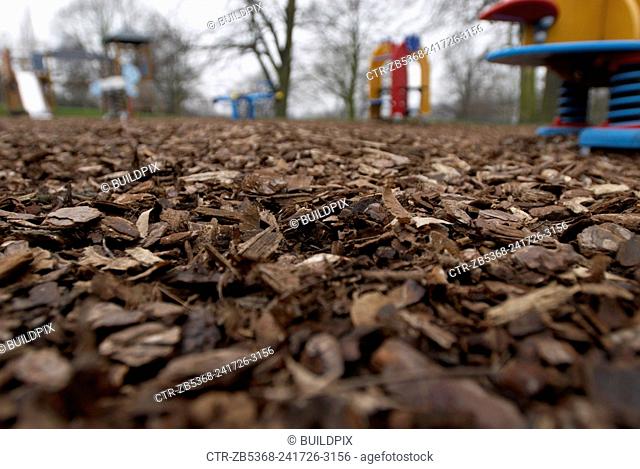 Playground surfacing with bark-based pine chipboards made of recycled material, Suffolk, England UK
