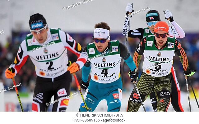Wilhelm Denifl (l-r) from Austra, Francois Braud from France and Johannes Rydzek from Germany in action on the course at the Nordic Ski World Championship in...