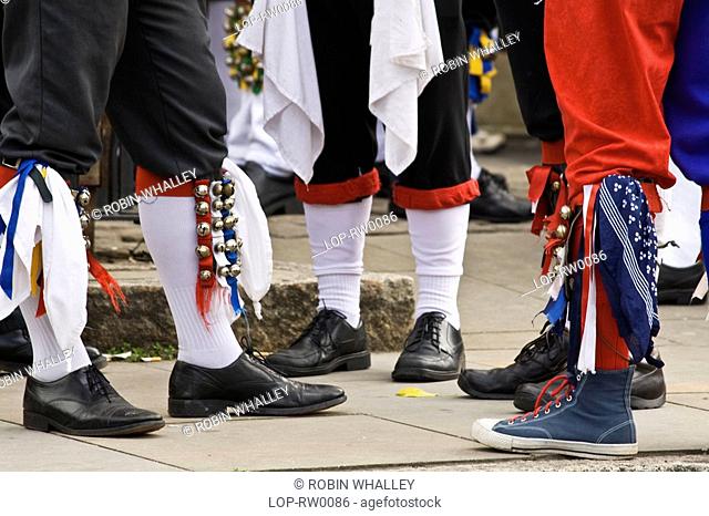 England, Lancashire, Uppermill, Bells on the legs of Morris Men at the Saddleworth Rushcart Festival