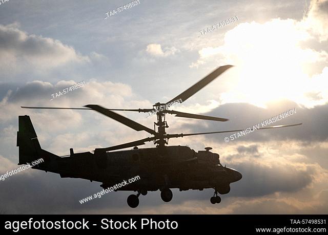 FEBRUARY 22, 2023: A Kamov Ka-52 reconnaissance and attack helicopter flies in the special military operation zone. Stanislav Krasilnikov/TASS