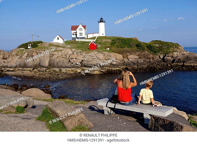 United States, Maine, York, Cape Neddick, Nubble Lighthouse located on an island near the coast