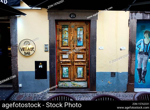 Beautiful painted door on a traditional street in Funchal, Madeira
