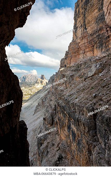 Europe, Italy, Dolomites, Veneto, Belluno. Hiker venturing to the Trenches of the First World War on Mount Paterno