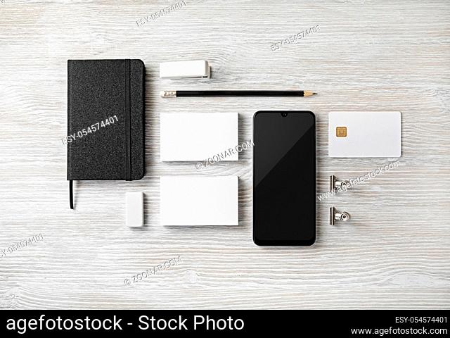 Stationery mock up on light wooden background. Responsive design template. Branding identity mock up. Flat lay