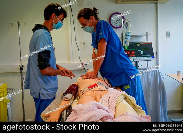 Anesthesiologist students during a critical situation resuscitation exercise at the Nimes Faculty of Medicine. Students train on a Sim Man 3 G robotic dummy