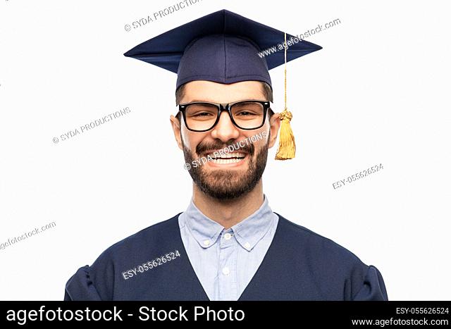 graduate student in mortar board and bachelor gown
