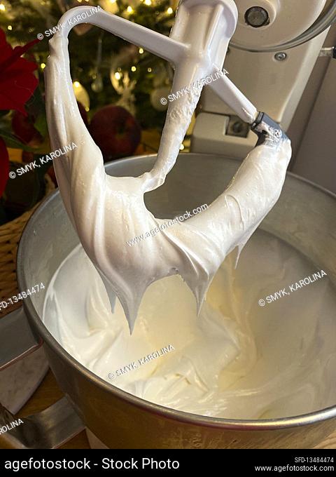 Preparing icing in the bowl of a food processor