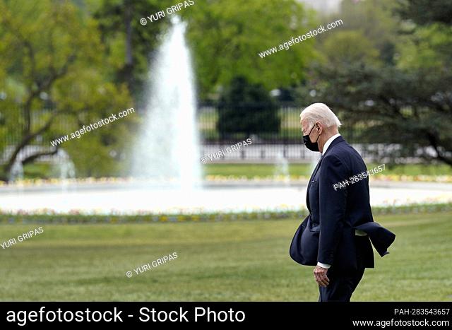 United States President Joe Biden walks on the South Lawn of the White House in Washington before his departure to Portland, Oregon on April 21, 2022