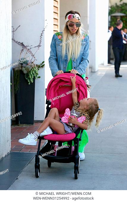 Petra Ecclestone seen pushing her daughter in a stroller after having lunch at E Baldi restaurant in Los Angeles, California