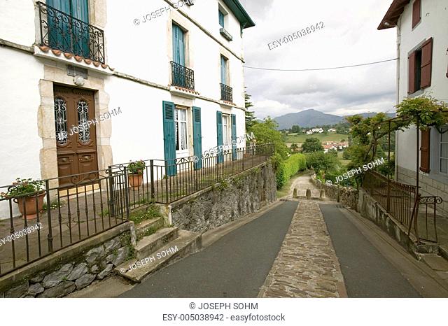 Path between homes in Sare, France in Basque Country on Spanish-French border, a hilltop 17th century village in the Labourd province