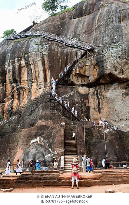 Visitors climbing the steep stairs to the rock fortress of Sigiriya, UNESCO World Heritage Site, Sigiriya, Sri Lanka