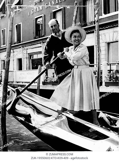 June 2, 1955 - Venice, Italy - American actress GLORIA SWANSON rowing a gondola on the Grand Canal in Venice where she will be attending the world premiere of...