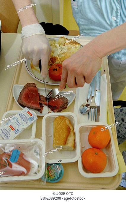 Photo essay from the University Hospital of Bordeaux. Cardiologic hospital of Haut-Leveque. Department of diabetology. Aide to the setting of the meal in a room...