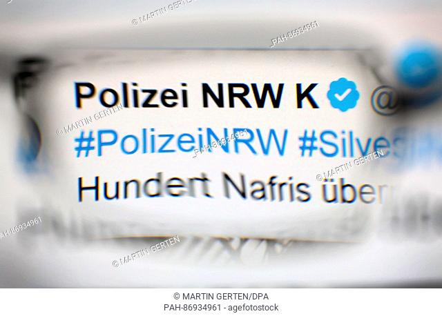 ILLUSTRATION - As seen through a lens the term 'Nafri' referring to North Africans can be seen in a tweet from the Cologne police from 31 December 2016 in...