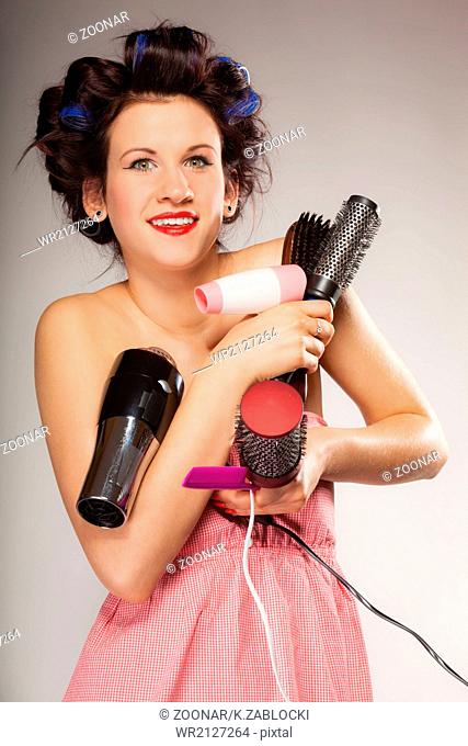 funny girl styling hair holds many accessories
