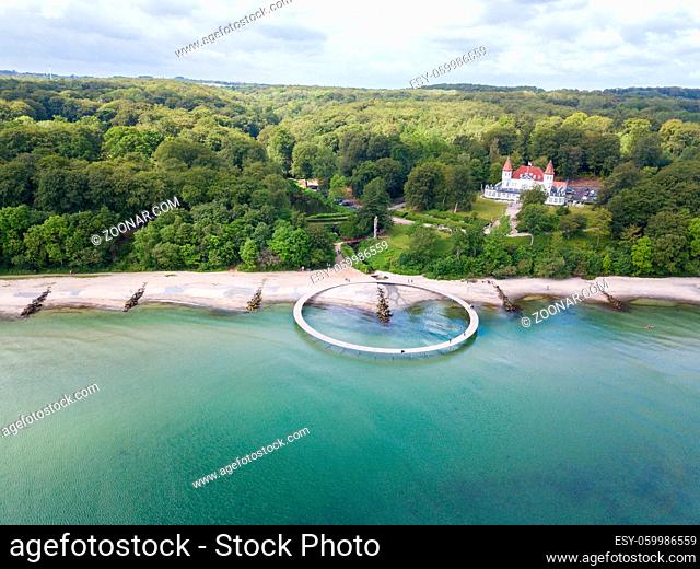 Aarhus, Denmark - June 9, 2019: Aerial drone view of the Infinity Bridge, a work of art by architect Niels Povlsgaard and Johan Gjoedes
