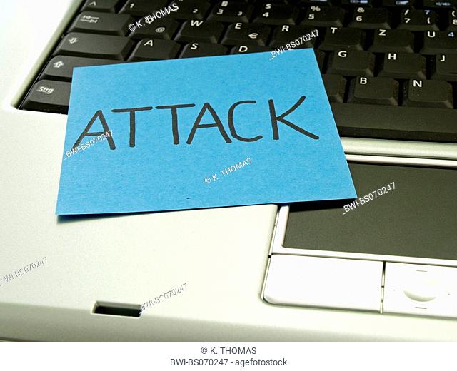 memo note on notebook, attack