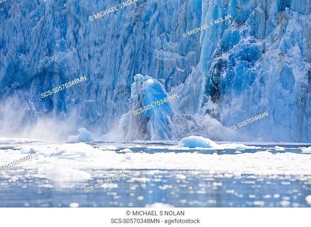 A HUGE calving event from the South Sawyer Glacier in Tracy Arm Wilderness Area in Southeast Alaska, USA Pacific Ocean This glacier is retreating several...