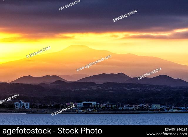 The view of Mount Hallasan taken during sunset hours from Udo Island. Jeju Island, South Korea