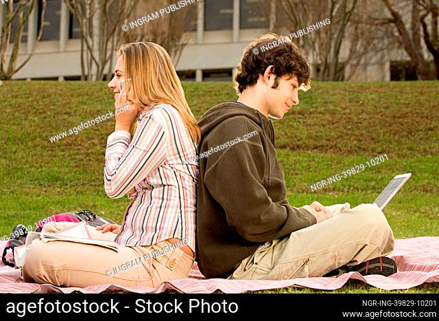 Two student studying outdoors