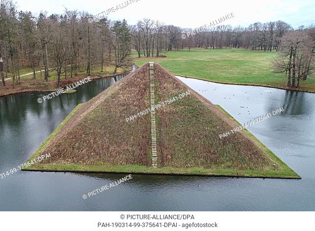 14 March 2019, Brandenburg, Branitz: View of the lake pyramid in the Fürst-Pückler-Park near Cottbus (aerial view with a drone)