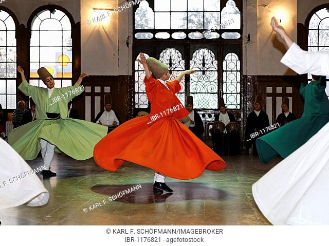 Ceremony of the dancing dervishes of the Sufi order Mevlevi, Sema ceremony, historic train station Sirkeci, Istanbul, Turkey