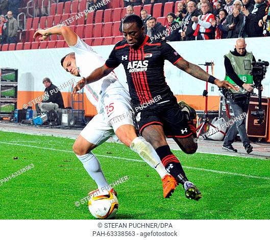 Augsburg's Raul Bobadilla (l) and Alkmaar's Ridgeciano Haps in action during the Europa League group L soccer match FC Augsburg vs AZ Alkmaar in Augsburg
