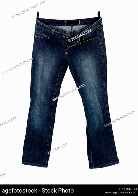 Jeans hanging from a clothes line isolated against a white background