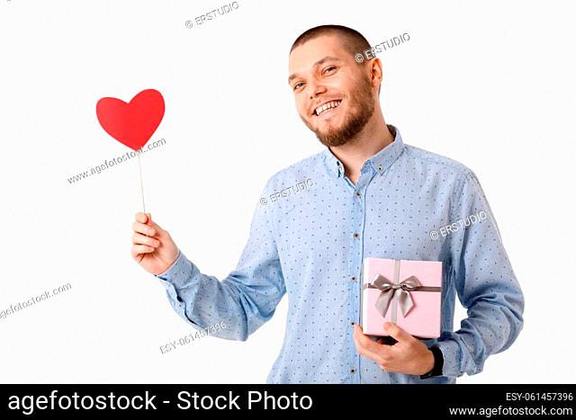 romantic man holding red paper heart and gift box isolated on white background