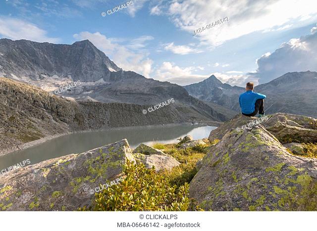 Hicker admire the Adamello Mount. Temù, Val d'Avio (Adamello Park), Brescia province, Lombardy, Italy, Europe
