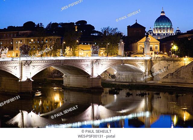 Italy, Rome, Vatican City, Basilica Saint Peter at night, seen from Ponte Vittorio Emmanuele