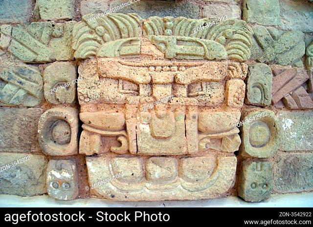 Stone face of mayan god in Copan muserum, Honduras