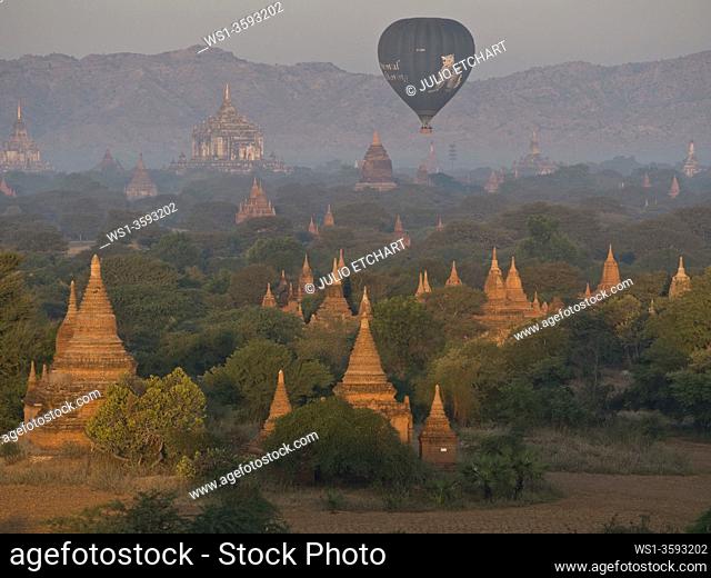 Balloons taking tourists at sunrise in the Buddhist temples of Bagan, Myanmar