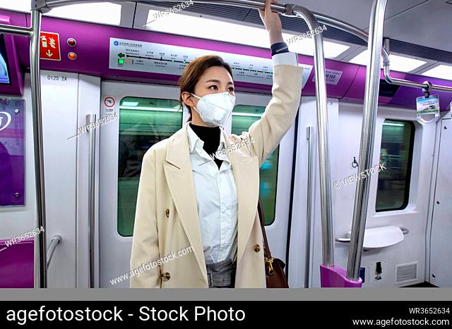 Young women take the subway